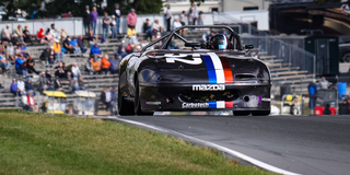 Workman Survives Wild FP Race, Earns First Title in 20 Tries